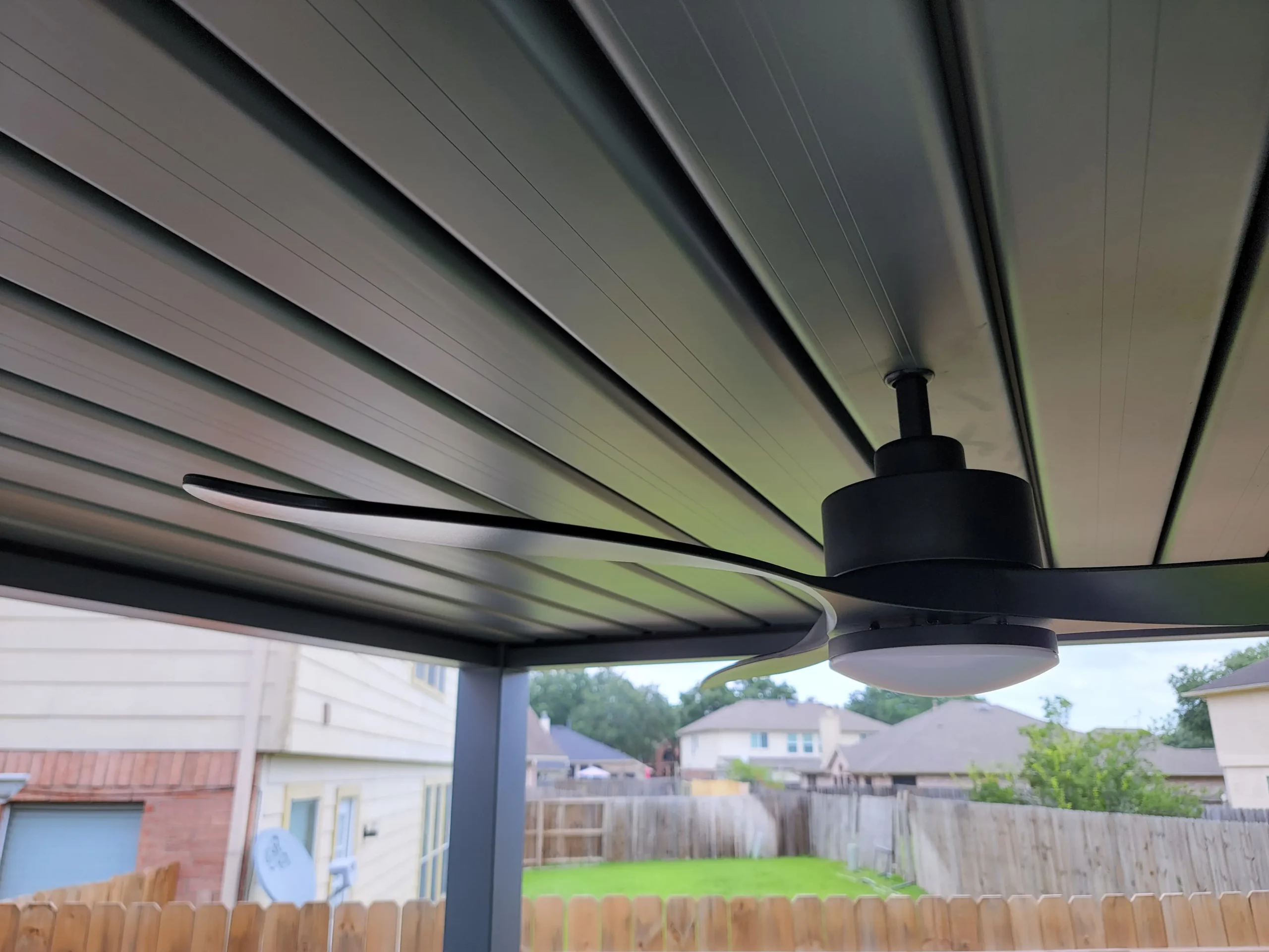 Detailed view of the built-in fan in the pergola