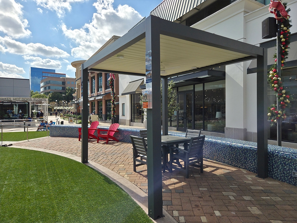 The outdoor motorized pergola at Woodlands Mall provide excellent protection from direct sunlight.
