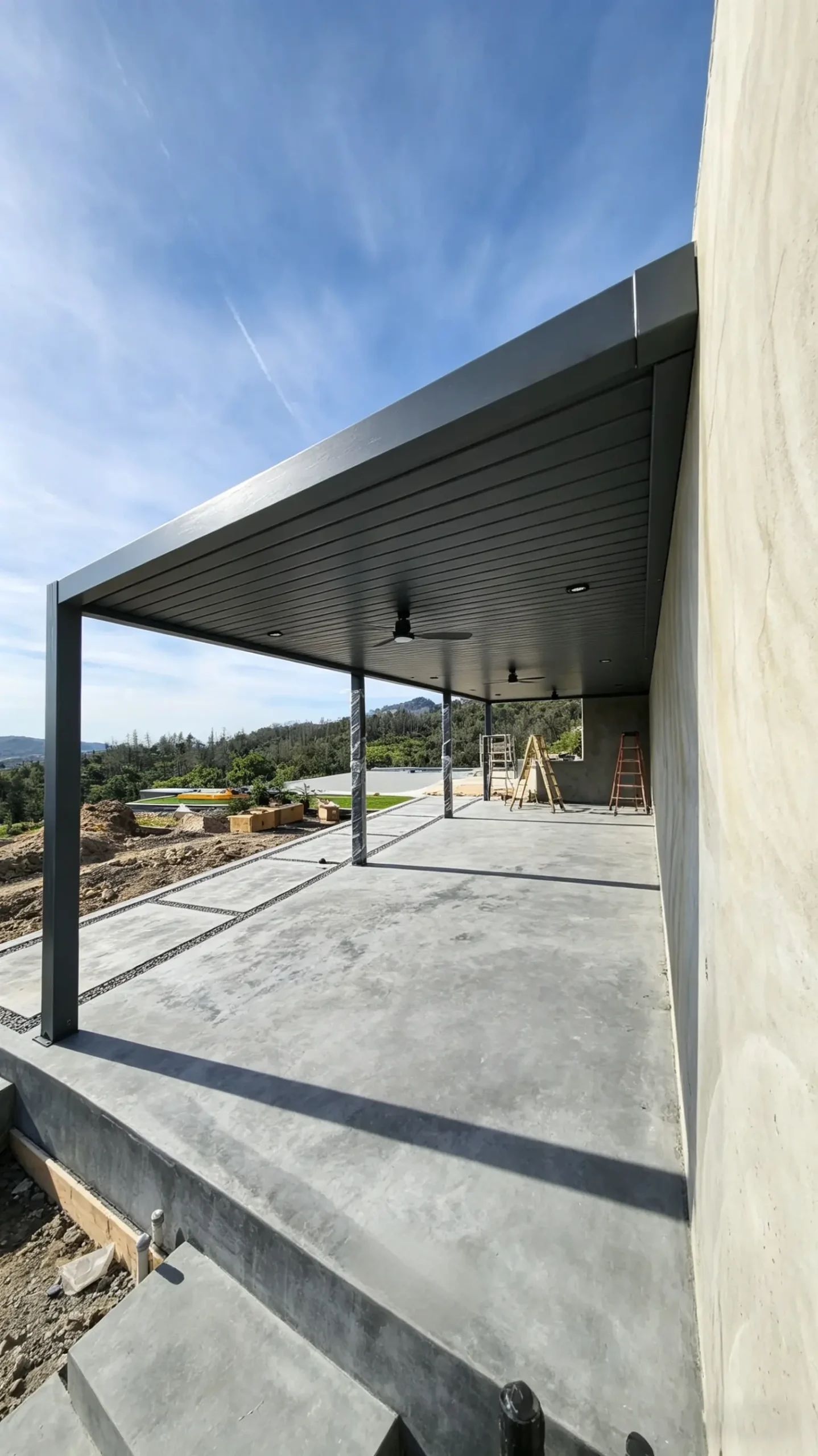 large connected louvered big pergola with ceiling fans on hillside patio